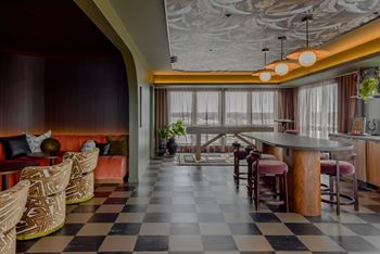 A restaurant with a black and white checkered floor.
